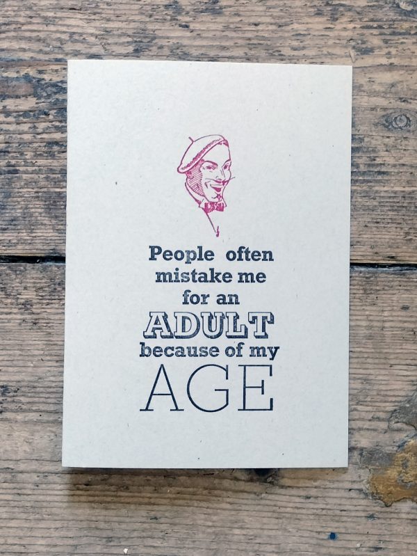 People often mistake me for an adult because of my age. - Letterpress Card. Hand printed in bright red and black, using original letterpress type.